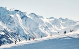 skiers on the piste