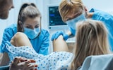Woman giving birth