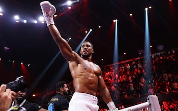 Anthony Joshua celebrates his victory