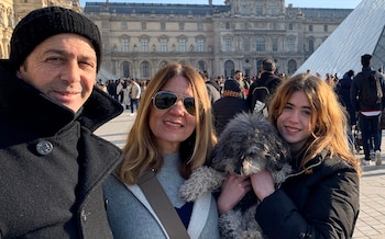 Mariano Janin, his wife Marisa, their daughter Mia and her dog, Lola