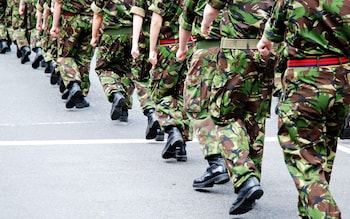 Soldiers marching in line