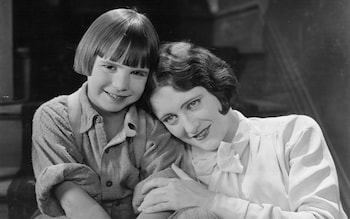 Jackie Coogan with Joan Crawford in 1925