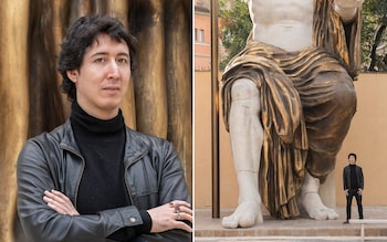 Restorer Otto Lowe in front of his fascimile of the 42ft Colossus of Constantine statue