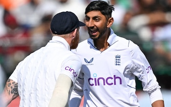 Shoaib Bashir celebrates with Ben Stokes