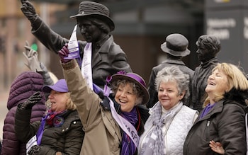 WASPI women gather at the statue of political activist Mary Barbour in Govan