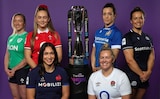 Edel McMahon, Ireland captain, Hannah Jones, Wales captain, Manae Feleu, France captain, Marlie Packer, England captain, Elisa Giordano, Italy captain and Rachel Malcolm, the Scotland captain pose with the Six Nations trophy