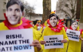 Demonstrators dressed as chickens protest opposite Downing Street in London as Labour is calling on Rishi Sunak to name the General Election date